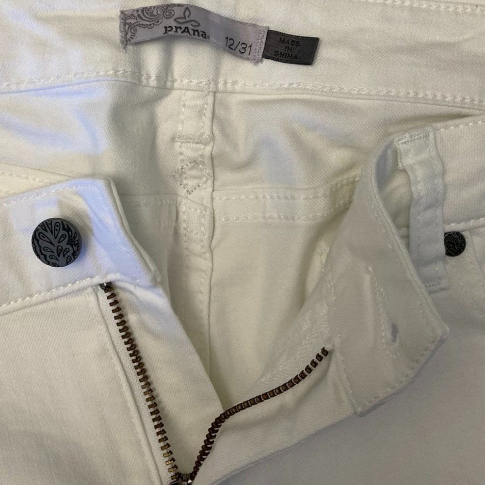 Women's white PrAna Jeans with stretch waist. Size 12/31